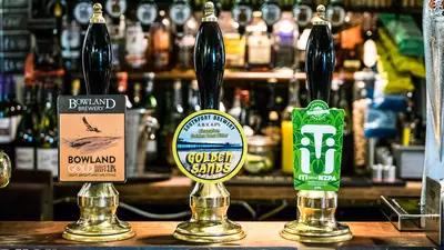 Real ale pumps and bottles at The Eagle and Child (photo 1 of 4)