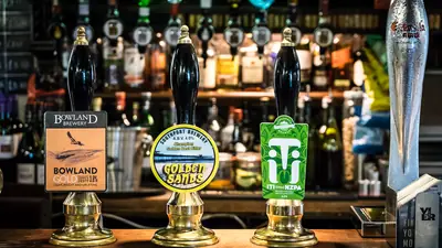 Real ale pumps and bottles at The Eagle and Child (photo 2 of 4)